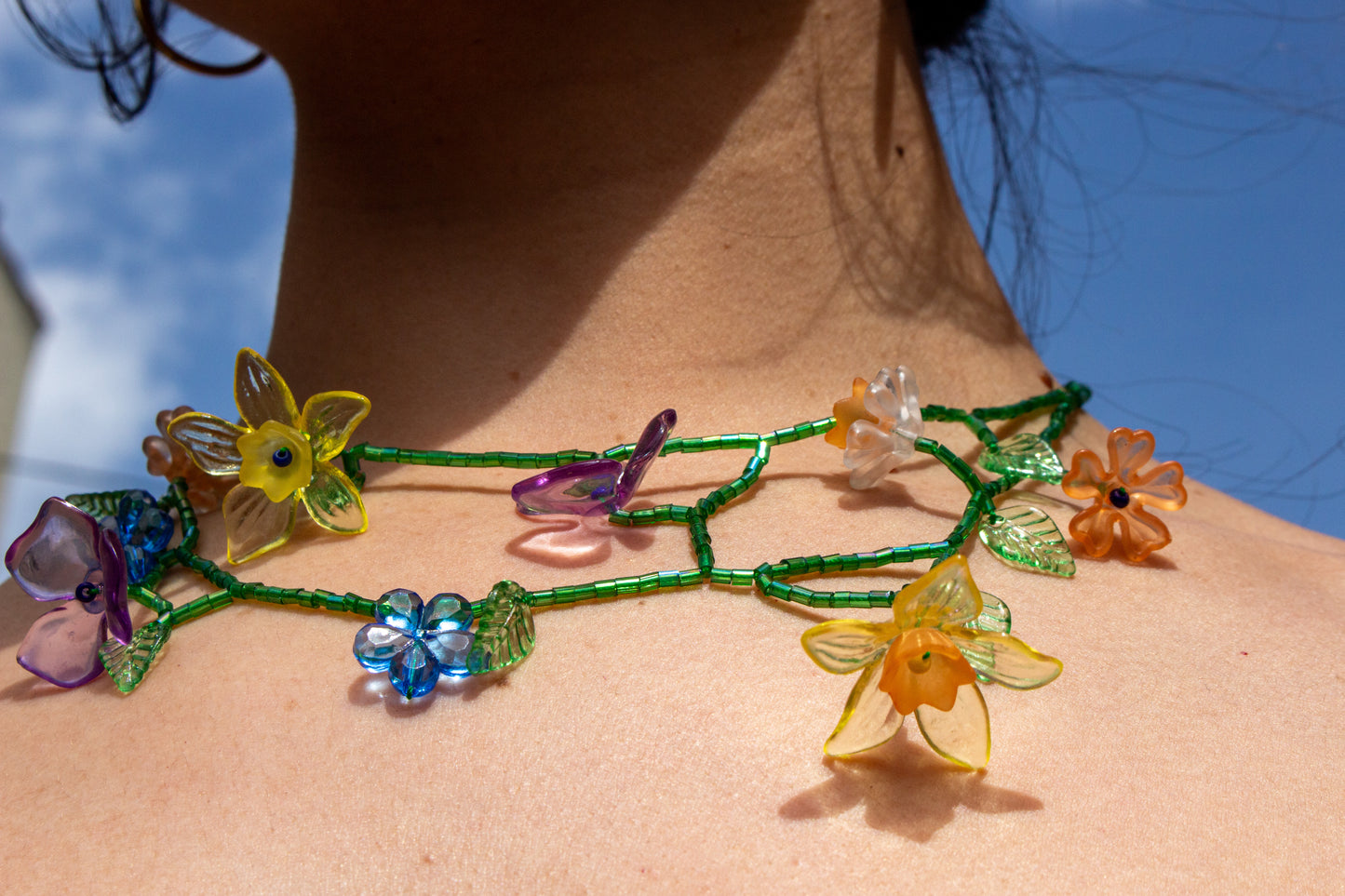 It is a floor bead necklace, with organic shape.